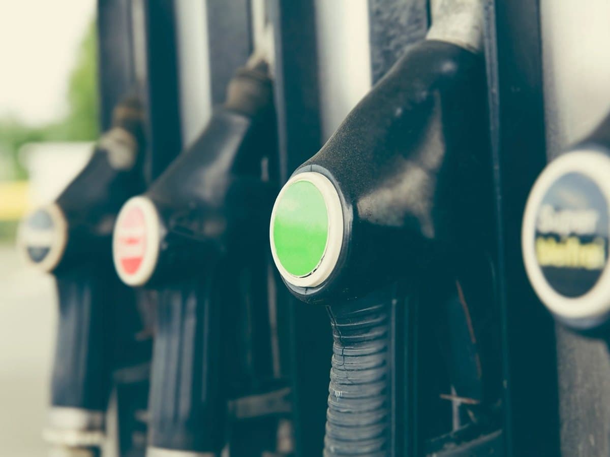 Fuel pump nozzles at a gas station
